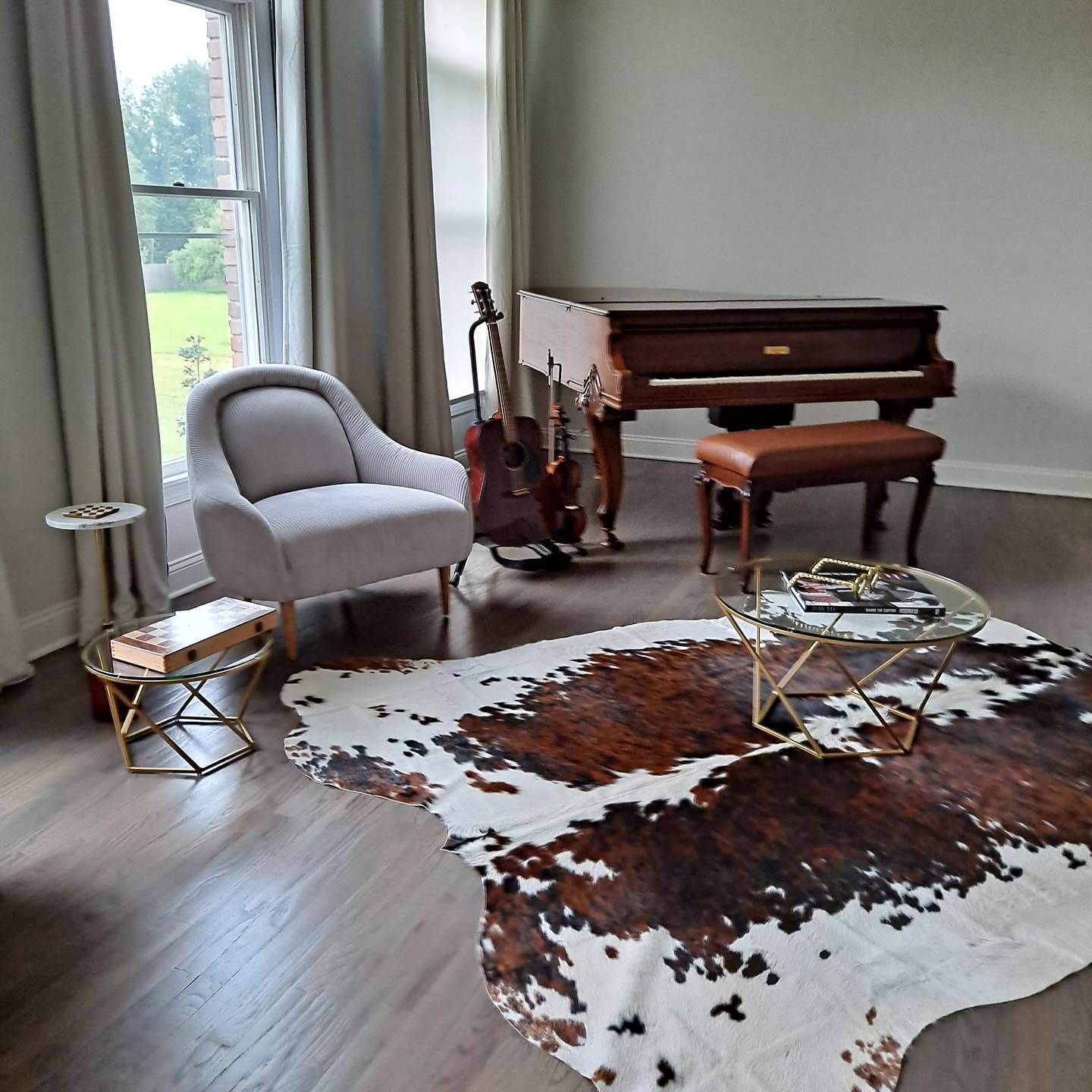 Elegant living room with piano cleaned by CF.B Cleaning